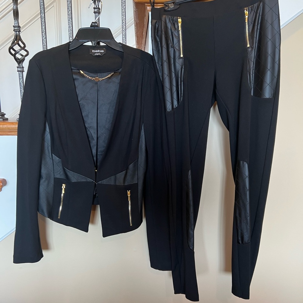 bebe Black Pantsuit with Gold zipper and pleather patches Accents size s/p